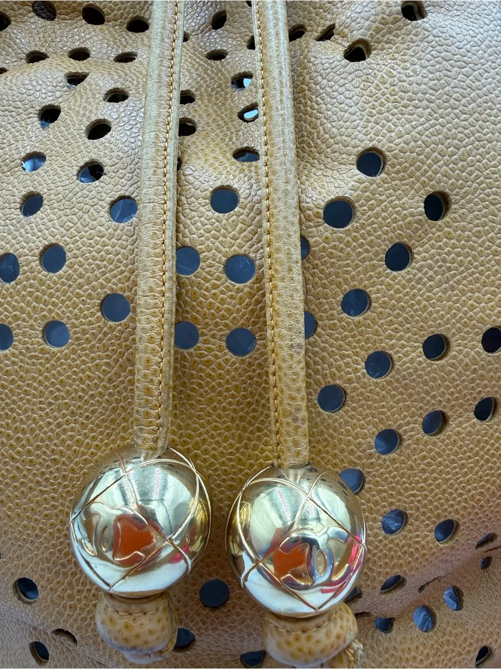 Chanel Perforated Drawstring Bucket Bag in Caviar Leather